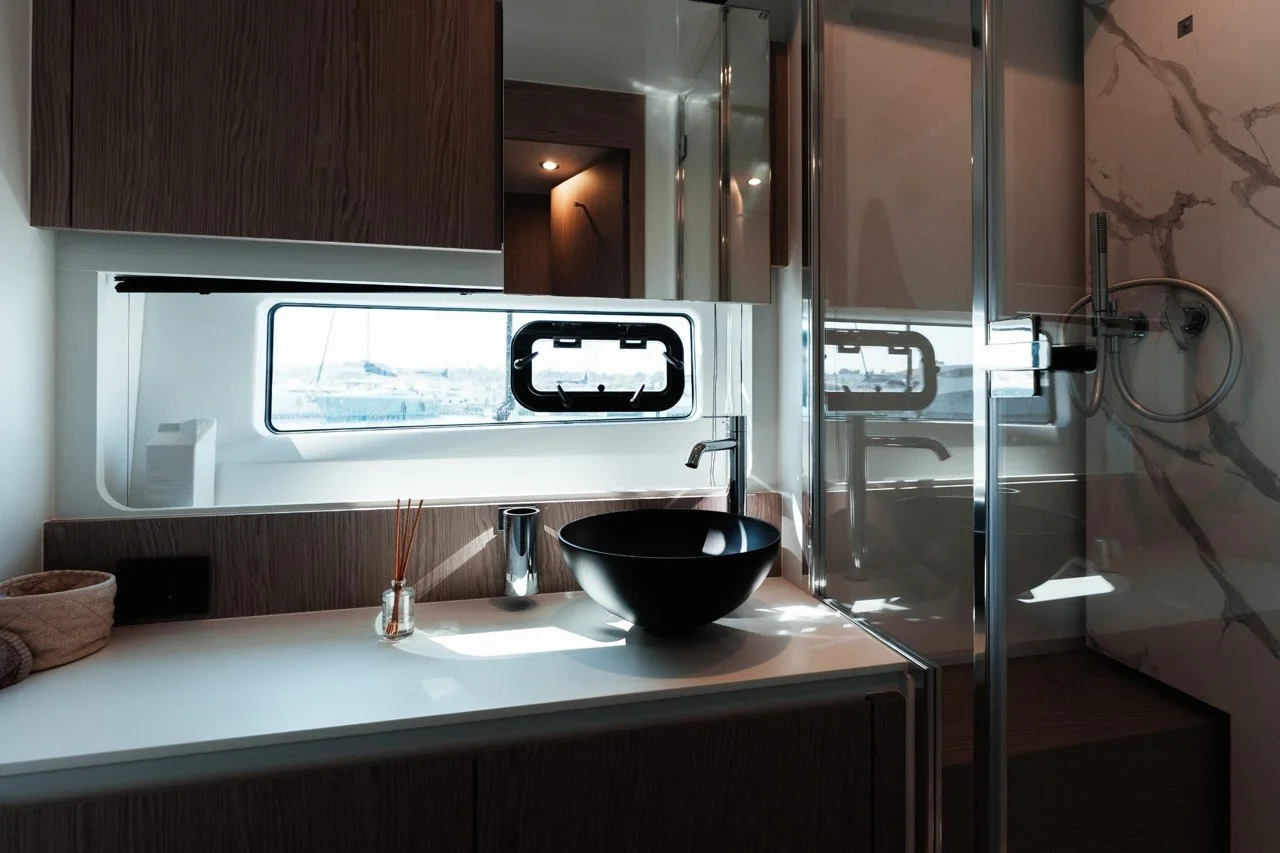 Modern bathroom with shower aboard the Azimut 53 Fly